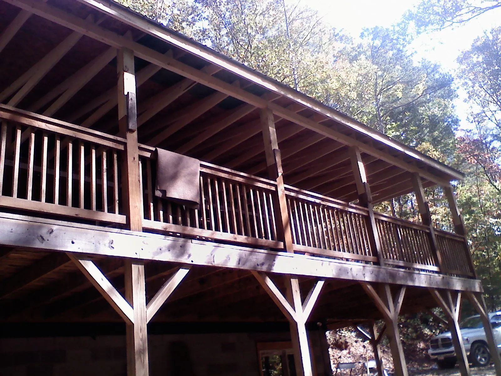Timber framing under a new elevated porch and deck — Roof Leak Repair in Volga by Roofing Brothers